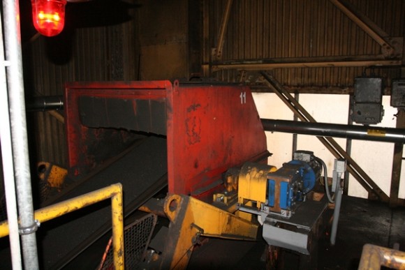 Elektromotor s převodovkou pasového dopravníku uhlí